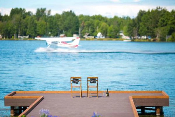 A rustic room with a view of Lake Hood at The Lakefront Anchorage