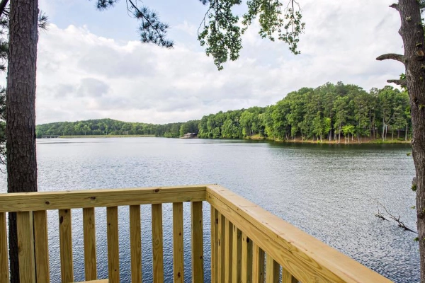 A campsite with a view of the lake at Stone Mountain Park