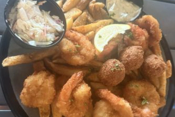 A plate of shrimp tacos from Doc’s Seafood & Steaks