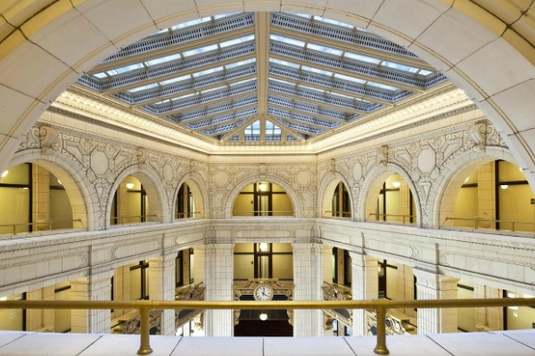 The historic, grand lobby of the Aloft Detroit hotel