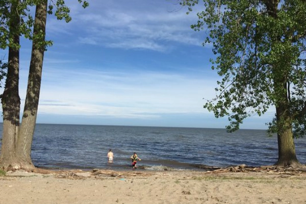 A campsite with a view of the lake at Sterling State Park