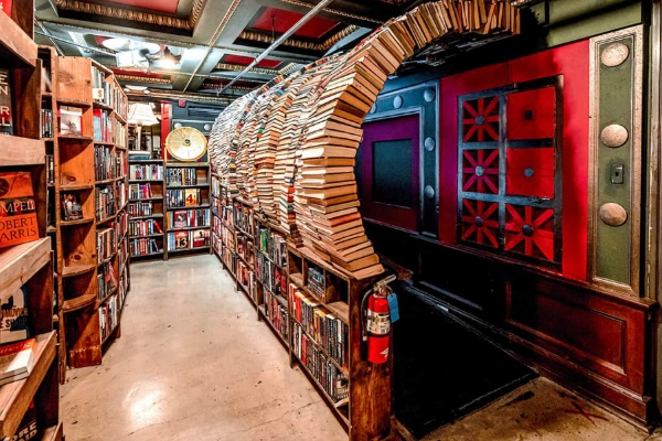 A tunnel made of books at The Last Bookstore