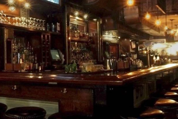 The historic speakeasy interior of Skull’s Rainbow Room