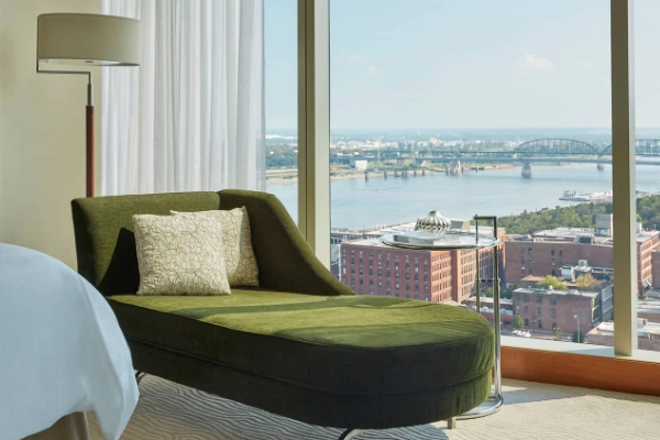 A luxurious room with a view of the Gateway Arch