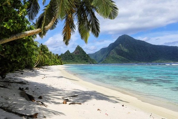 The powdery white sand and clear turquoise water of Ofu Beach
