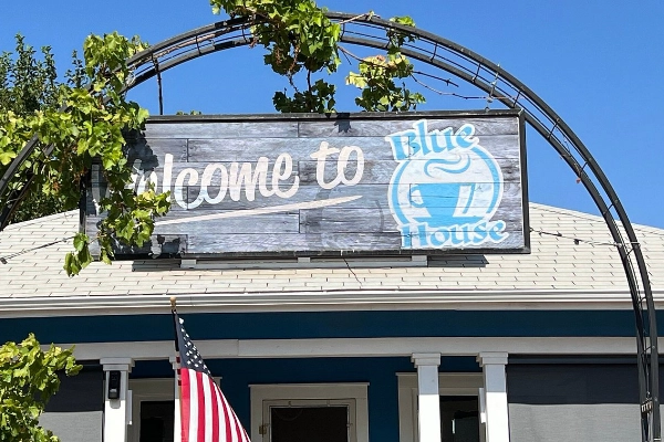 A delicious flaky croissant and coffee from Blue House Bakery