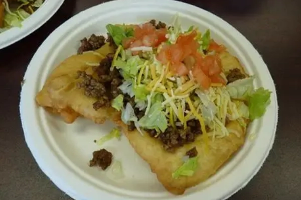 A plate of frybread tacos from the Timbisha Shoshone stand