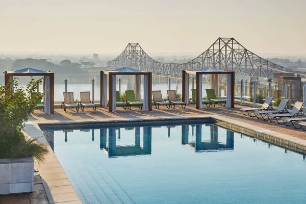 A luxurious room with a skyline view at the Four Seasons Hotel St. Louis