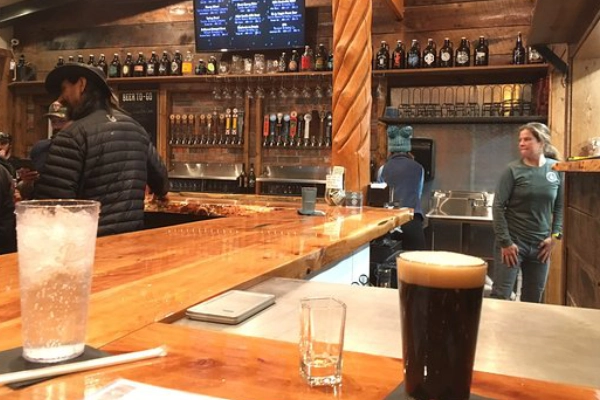 A wood-fired pizza and a craft beer from Cloudcroft Brewing Company