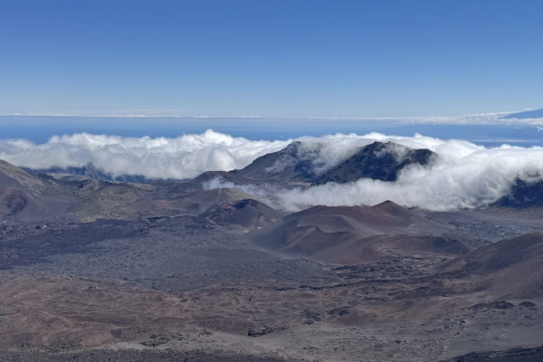 Clouds swirling like cotton candy at the Leleiwi Overlook