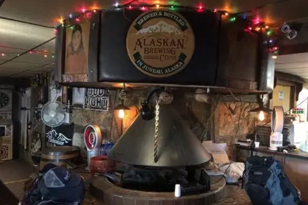 The cozy, classic diner interior of Eddie’s Fireplace Inn