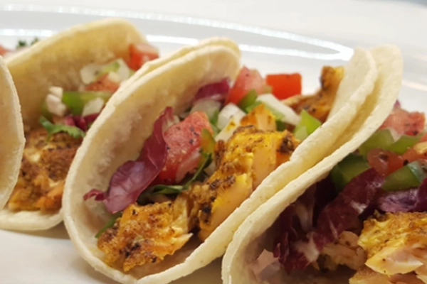 A plate of fresh salmon tacos from Emir’s Café