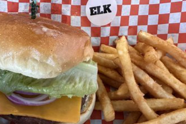 A hearty elk burger and huckleberry pancakes from a local diner
