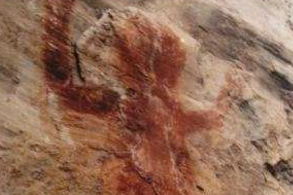 Ancient Cherokee carvings on a rock at a mountain summit