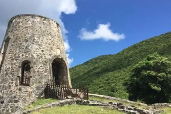 The crumbling 18th-century ruins of a windmill at a sugar plantation