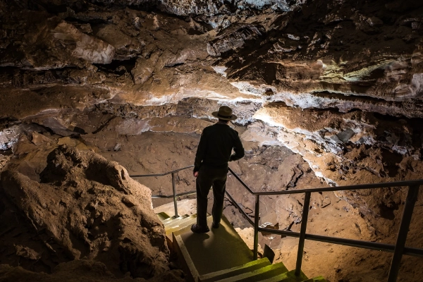 A park ranger talking to a group of visitors at an overlook