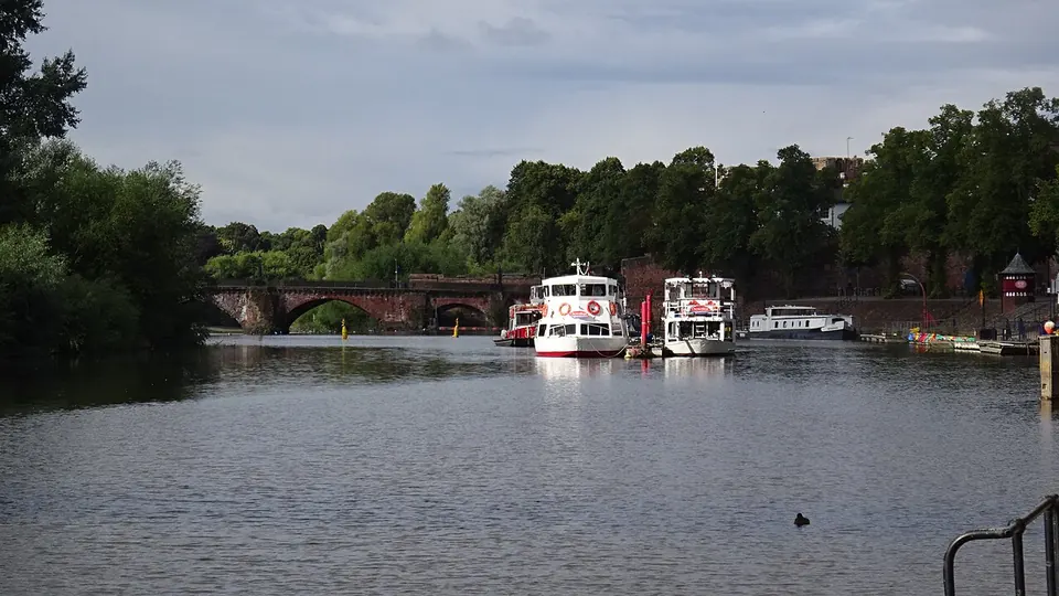 Chester destination photo: River Dee and tourist boats at Chester waterfront, Cheshire