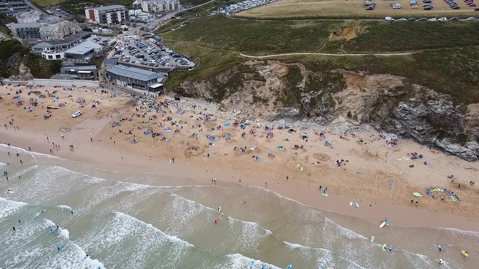 Newquay, Cornwall destination photo: Busy Watergate Bay Beach Newquay Cornwall by Kernow Skies