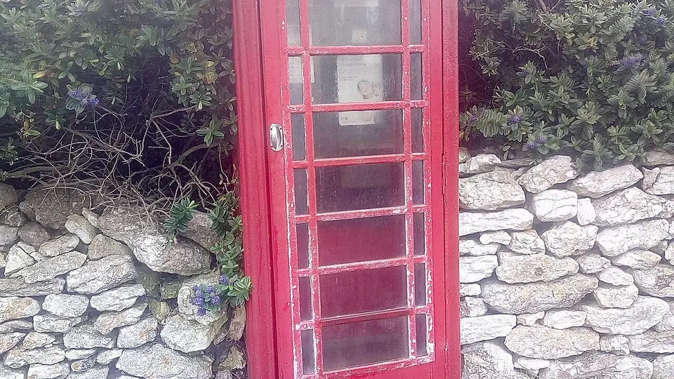Rathlin Island destination photo: The phone box in Church Bay on Rathlin Island off Northern Ireland is listed