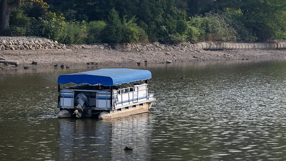 Stratford-upon-Avon destination photo: Cruise boat with collapsed awning on Avon River, Stratford, Ontario, 2025-08-04